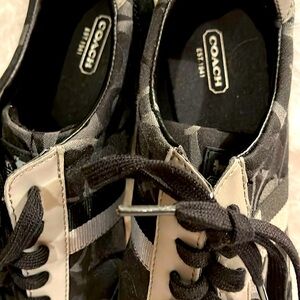 Lovely coach sneakers very comfortable worn 1 time just not my style